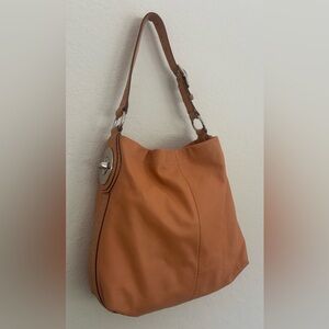 Coach Authentic Coral leather w/snake skin handbag
B1169-F16535